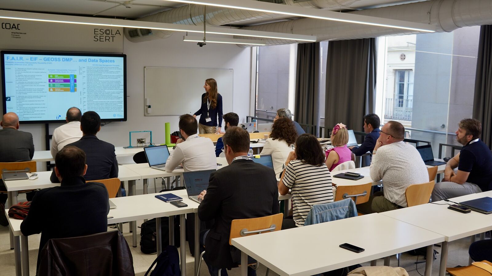 Francesca Noardo (OGC) during her presentation at the BDTIC 2024.